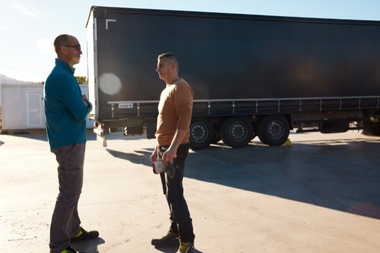 two men enjoying safe truck parking in orlando fl
