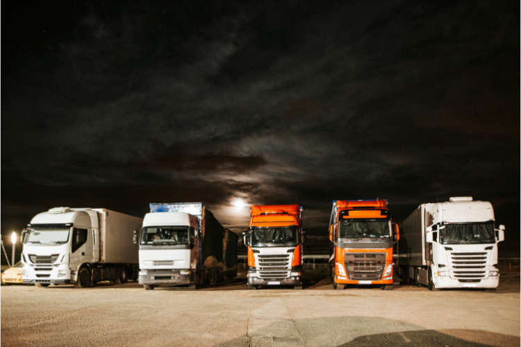 trucks in parking lot at night in orlando